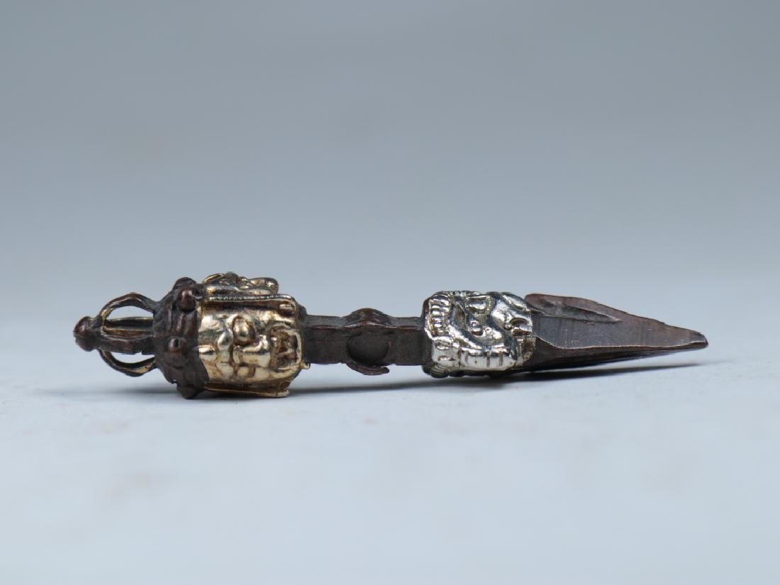 a white copper demon vanquishing pestle (1 of 6)