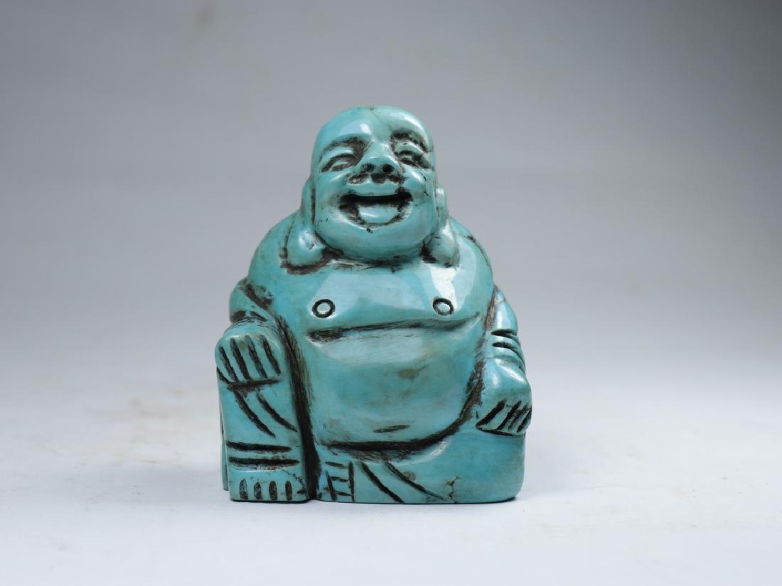 a turquoise buddha statue (1 of 6)