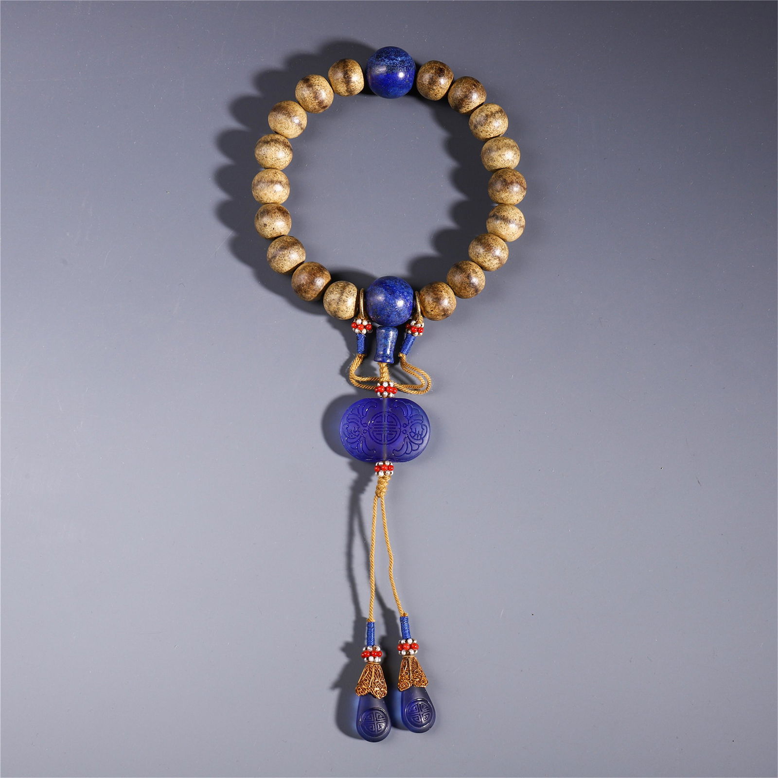 A CHINESE AGALWOOD BEAD BUDDHIST BRACELET (1 of 6)