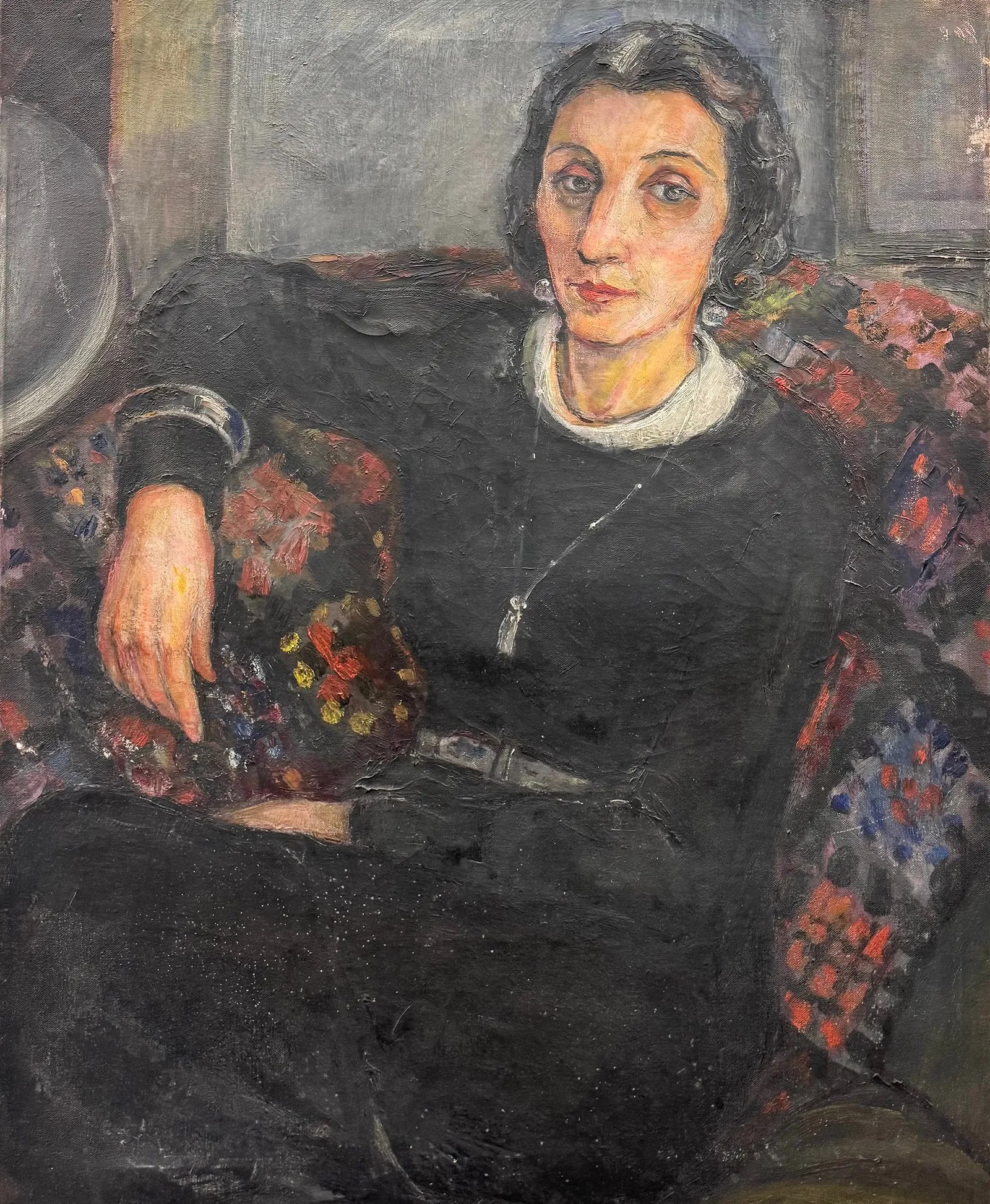 Modernist Circa 1930's Portrait of a Seated Woman in Black on a Patterned Divan: Oil painting on canvas 32 x 26 in