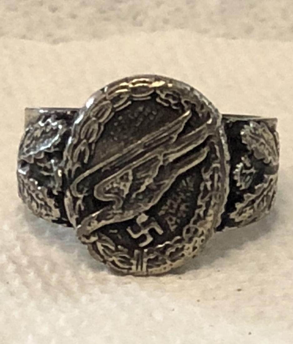 GERAMAN WW2 LUFTWAFFE PARATROOPER RING. DATED 1947.: GERAMAN WW2 LUFTWAFFE PARATROOPER RING. DATED 1947. IN EXCELLENT SHAPE AND OVERALL CONDITION. PLEASE VIEW PICTURES FOR DETAILS.