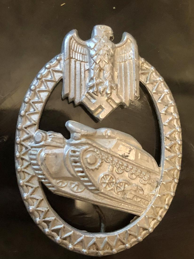 GERMAN NAZI WW2 WEHRMACHT PANZER MARKSMANSHIP SILVER: GERMAN NAZI WW2 WEHRMACHT PANZER MARKSMANSHIP SILVER GRADE BADGE MADE FOR WEAR UPON A LANYARD. THE BADGE SHOWS A TANK WREATHED BY TANK TREADS AND IS TOPPED BY AN EAGLE WITH A SWASTIKA. THE WIRES ARE S