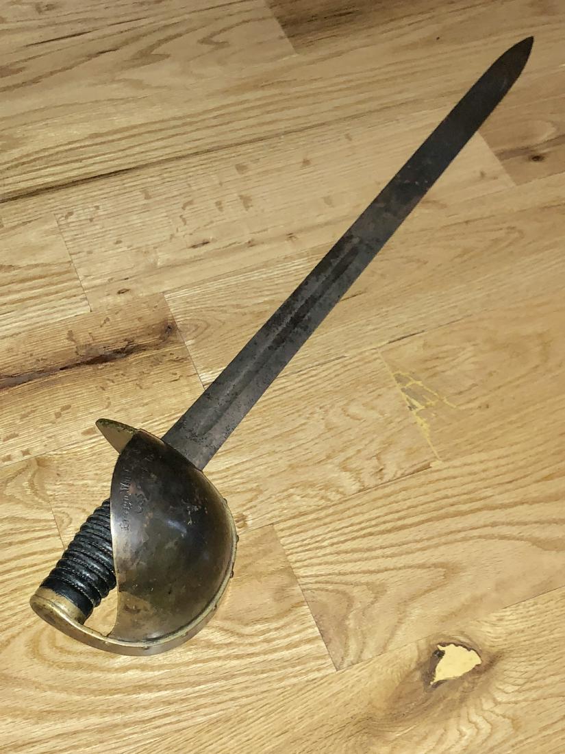 RARE CIVIL WAR CSS CHARLESTON NAVAL CUTLASS ENSIGN: RARE CIVIL WAR CSS CHARLESTON NAVAL CUTLASS ENSIGN WHITFIELD SELBY. IN MINT SHAPE AND EXCELLENT OVERALL CONDITION. HAS A BEATUTRIFUL OVERALL PATINA. CUTLASS IS MARKED ENSIGN WHITFIELD SELBY CSS CHARLE