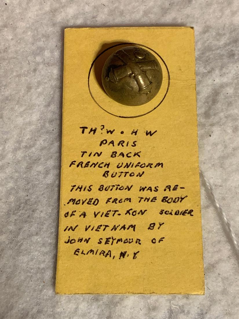 RARE FRENCH UNIFORM BUTTON WITH IDENTIFICATION: RARE FRENCH UNIFORM BUTTON WITH IDENTIFICATION. THIS BUTTON WAS REMOVED FROM THE BODY OF A VIETNAM SOLDIER BY JOHN SEYMOUR OF ELMIRA, N.Y. A RARE FIND THAT COMES WITH HISTORY. A GREAT ADDITION TO YOUR