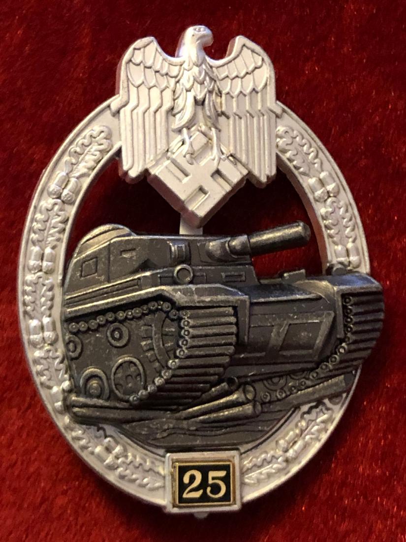 WW2 GERMAN MARKED JFS PANZER 25YR ASSAULT BADGE: WW2 GERMAN MARKED JFS PANZER 25YR ASSAULT BADGE. IN GREAT SHAPE AND OVERALL CONDITION. THIS IS A RARE FIND THAT WOULD MAKE A GREAT ADDITION TO YOUR COLLECTION.
