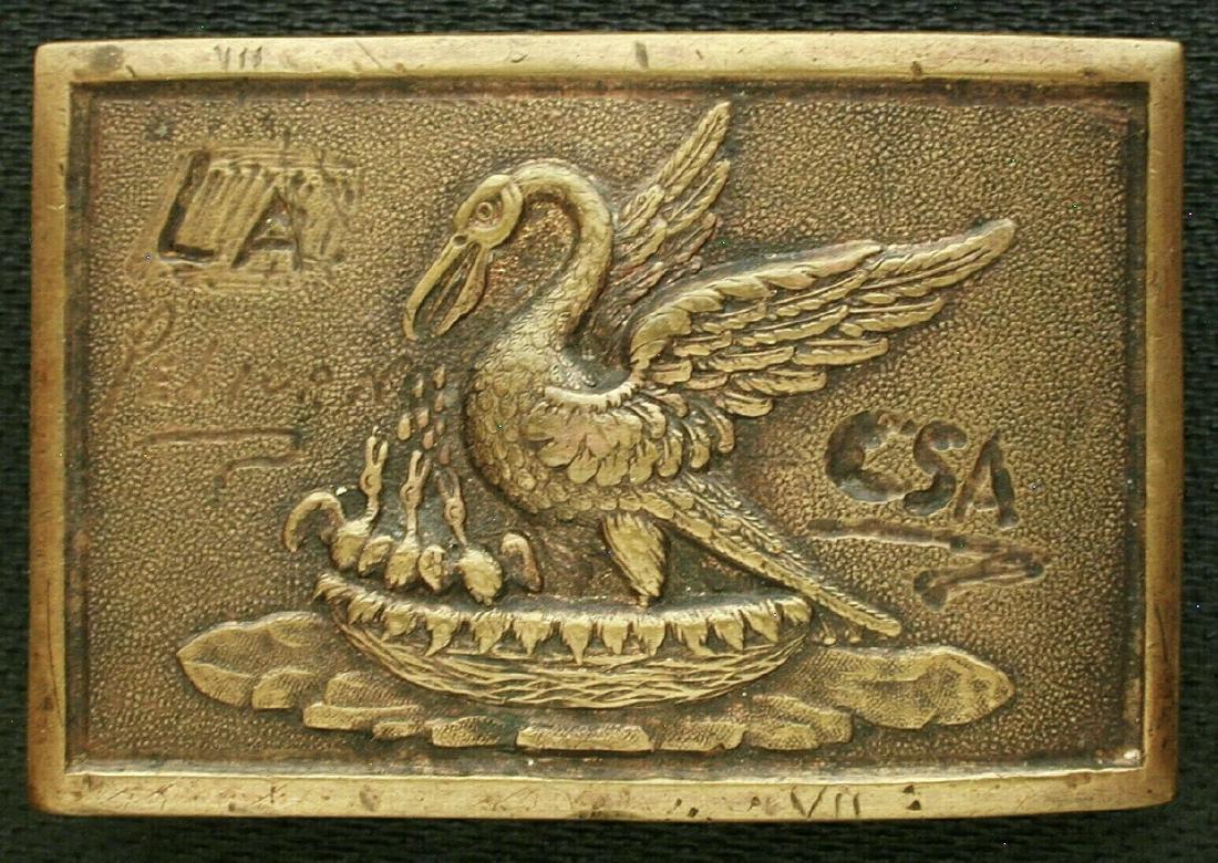 DATED 1864 CIVIL WAR CONFEDERATE LOUISIANA BELT BUCKLE: DATED 1864 CIVIL WAR CONFEDERATE LOUISIANA BELT BUCKLE. IN EXCELLENT SHAPE AND CONDITION WITH A BEAUTIFUL OVERALL PATINA. HAS 1864 ENGRAVED ON THE REAR WITH "LA" AND "C.S.A." ON THE FRONT. PLEASE VIEW