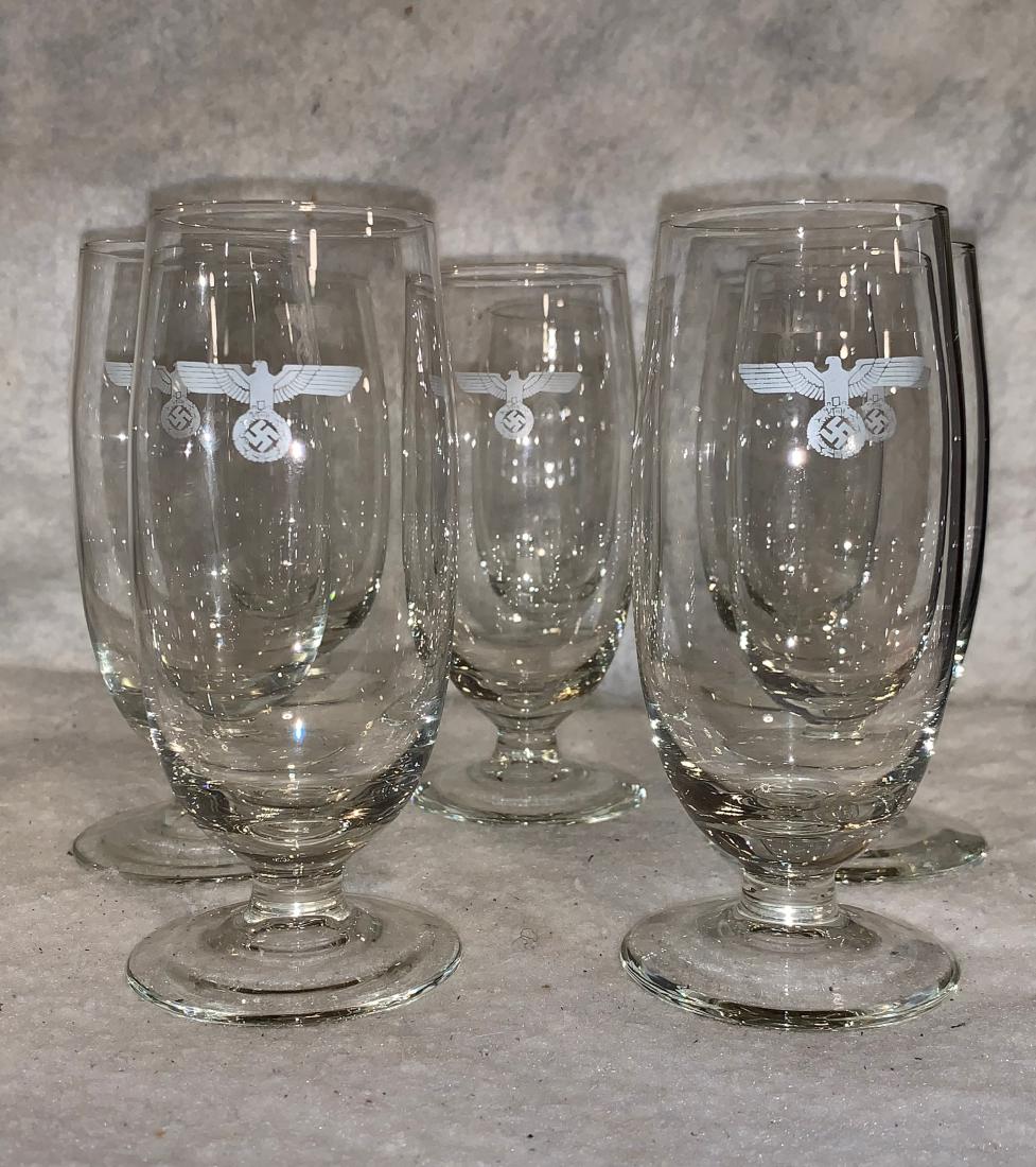 RARE WW2 GERMAN NAZI 8 CUPS WINE GLASS SET: RARE WW2 GERMAN NAZI 8 CUPS GLASS SET. COMES AS A SET. 8 GLASSES IN TOTAL. IN EXCELLENT SHAPE AND MINT OVERALL CONDITION. PLEASE VIEW ALL DETAIL PICTURES. A GREAT ADDITION TO YOUR COLLECTION.