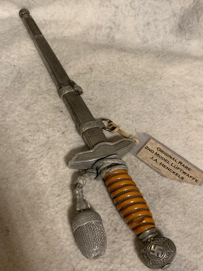 WW2 GERMAN 2ND MODEL LUFTWAFFE DAGGER J.A. HENCKELS: RARE WW2 GERMAN 2ND MODEL LUFTWAFFE DAGGER J.A. HENCKELS. THIS IS A RARE FIND BY A RARE MAKER. IN EXCELLENT OVERALL SHAPE AND CONDITION. PLEASE VIEW ALL DETAILED PICTURES. A GREAT FIND AND AN EXCELLEN