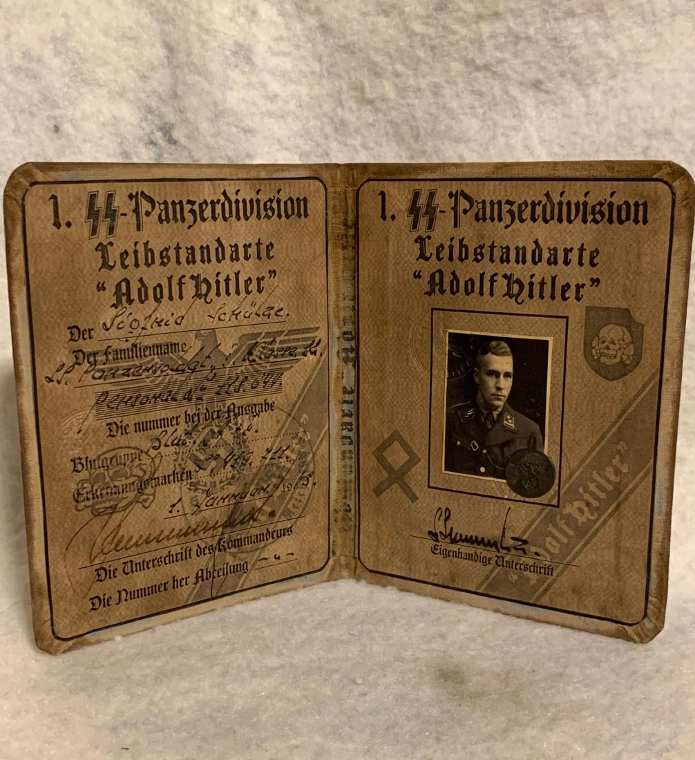 WW2 GERMAN NAZI PANZER DIVISION OFFICERS PASSPORT: WW2 GERMAN NAZI PANZER DIVISION OFFICERS PASSPORT. IN EXCELLENT OVERALL SHAPE AND CONDITION WITH A BEAUTIFUL OVERALL PATINA. THIS IS A RARE FIND. WOULD MAKE A GREAT ADDITION TO YOUR WW2 COLLECTION.