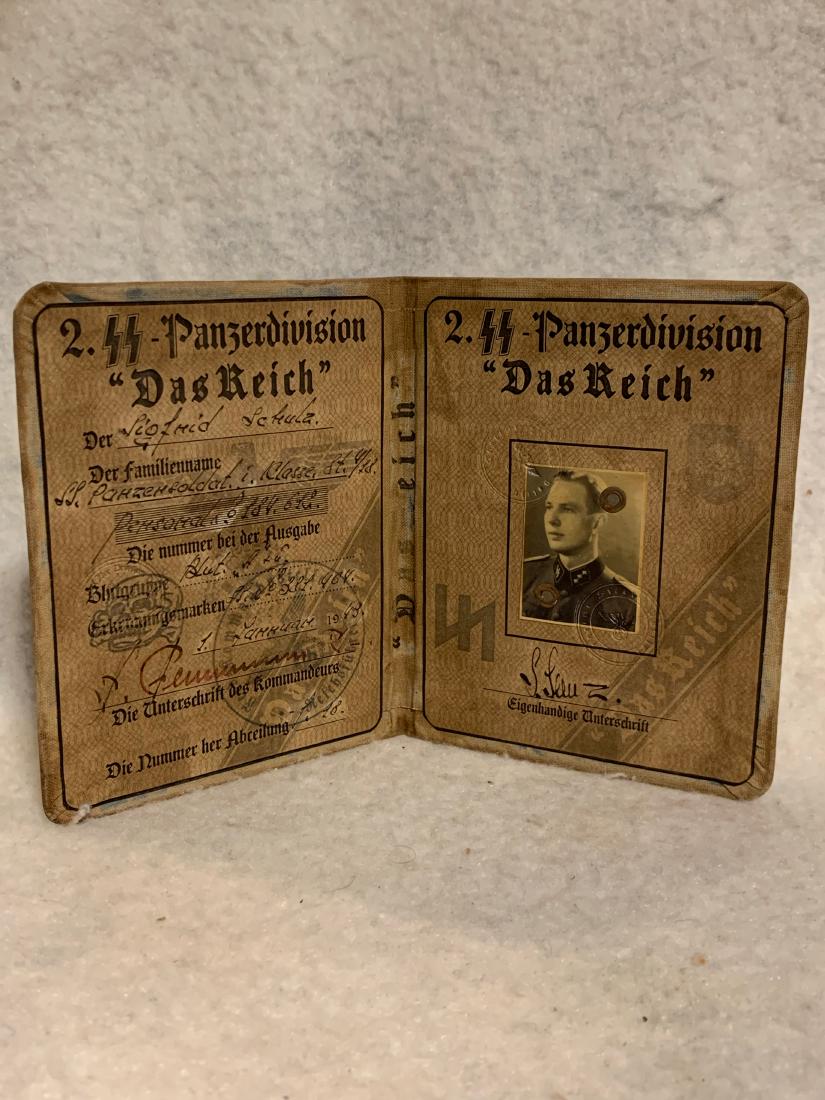 WW2 GERMAN NAZI SS PANZER DIV. DAS REICH PASSPORT: RARE GERMAN NAZI SS PANZER DIV. DAS REICH PASSPORT. IN EXCELLENT SHAPE AND OVERALL CONDITION WITH A BEAUTIFUL OVERALL PATINA. A GREAT FIND AND AN EXCELLENT ADDITION TO YOUR COLLECTION.