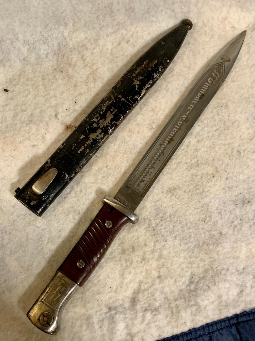 WW2 GERMAN SS MEINE EHRE HEISST TREUE BAYONET W/: WW2 GERMAN SS MEINE EHRE HEISST TREUE BAYONET W/ SCABBARD. IN EXCELLENT SHAPE AND OVERALL CONDITION. HAS THE SERIAL NUMBERS ON IT. MARKED SS AS WELL AS ETCHED BLADE. THIS IS ONE OF THE RAREST GERMAN B
