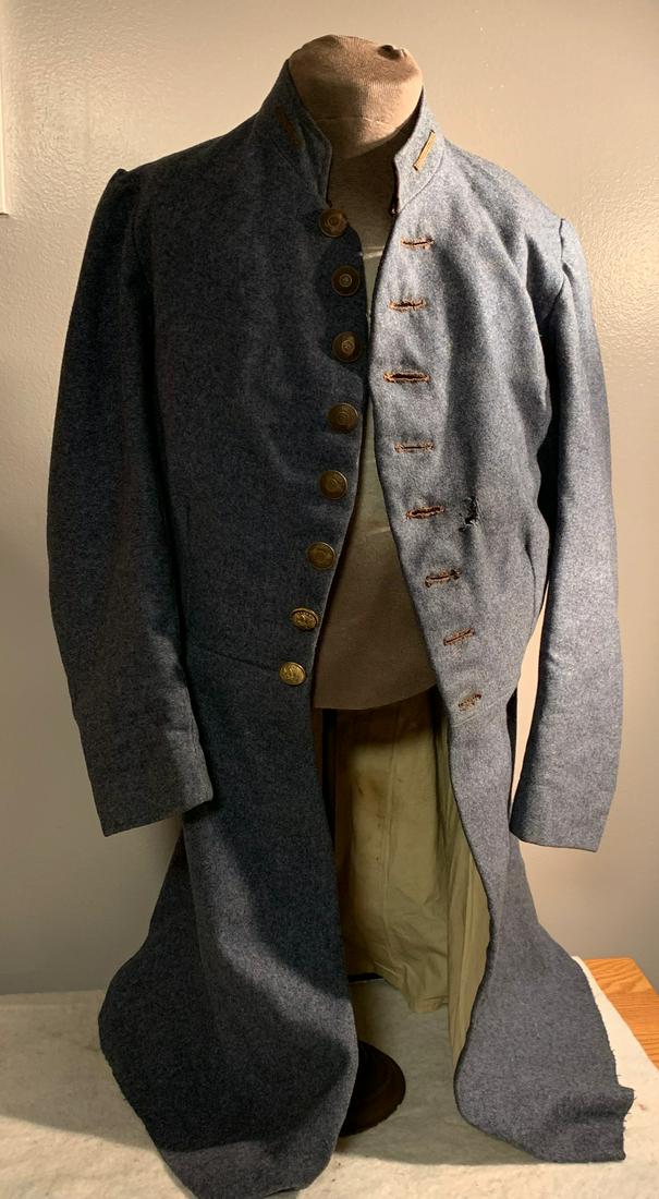 RARE CIVIL WAR CONFEDERATE N.C. OFFICERS LONG COAT: RARE CIVIL WAR CONFEDERATE N.C. OFFICERS LONG COAT. IN EXCELLENT SHAPE AND OVERALL CONDITION. COAT APPEARS TO BE VERY WELL WORN AND BATTLE USED - VIEW PICTURES. A FEW MOTHING, RIPS, TEARS, WHICH IS EX