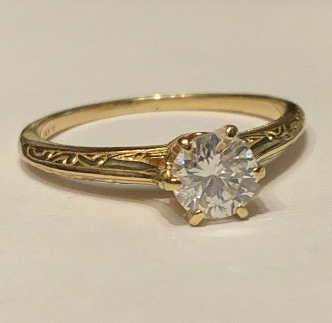 14K GOLD 0.50 CT SI, H DIAMOND WEDDING RING: 14K GOLD 0.50 CT SI, H DIAMOND WEDDING RING. RING HAS A 0.50 CT CENTER DIAMOND THAT IS SI IN CLARITY WITH A COLOR GRADING OF H-1.