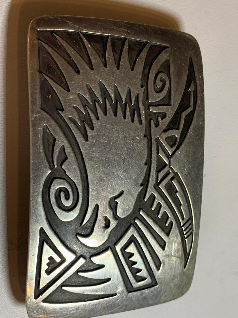 SIGNED SG STERLING SILVER BELT BUCKLE: SIGNED SG STERLING SILVER BELT BUCKLE. IN GOOD SHAPE AND OVERALL CONDITION. PLEASE VIEW PICTURES.