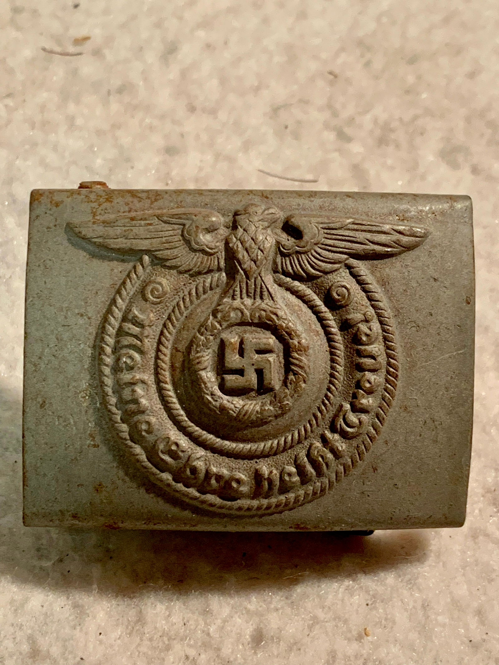 WW2 GERMAN SS BELT BUCKLE - MEINE EHRE HEIBT TREUE: WW2 GERMAN SS BELT BUCKLE FEATURING - MEINE EHRE HEIBT TREUE "MY HONOR IS CALLED LOYALTY." IN EXCELLENT OVERALL SHAPE AND CONDITION. HAS A BEAUTIFUL OVERALL PATINA. A RARE FIND AND AN EXCELLENT ADDITI
