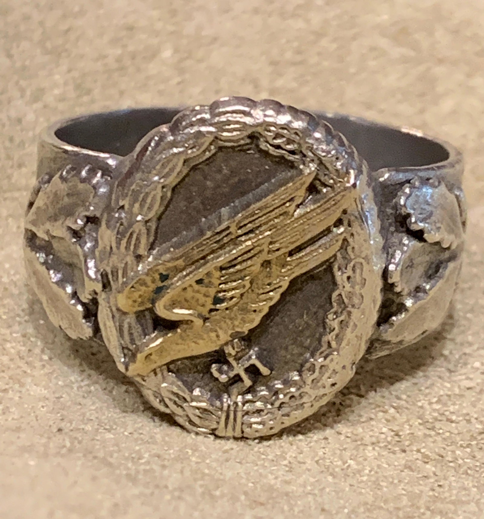 SCARCE WW2 GERMAN PARATROOPER RING STERLING SILVER: SCARCE WW2 GERMAN PARATROOPER RING STERLING SILVER. IN EXCELLENT SHAPE AND OVERALL CONDITION. STAMPED 925. WAS BROUGHT BACK FROM GERMANY. A GREAT FIND AND AN EXCELLENT ADDITION TO YOUR COLLECTION.