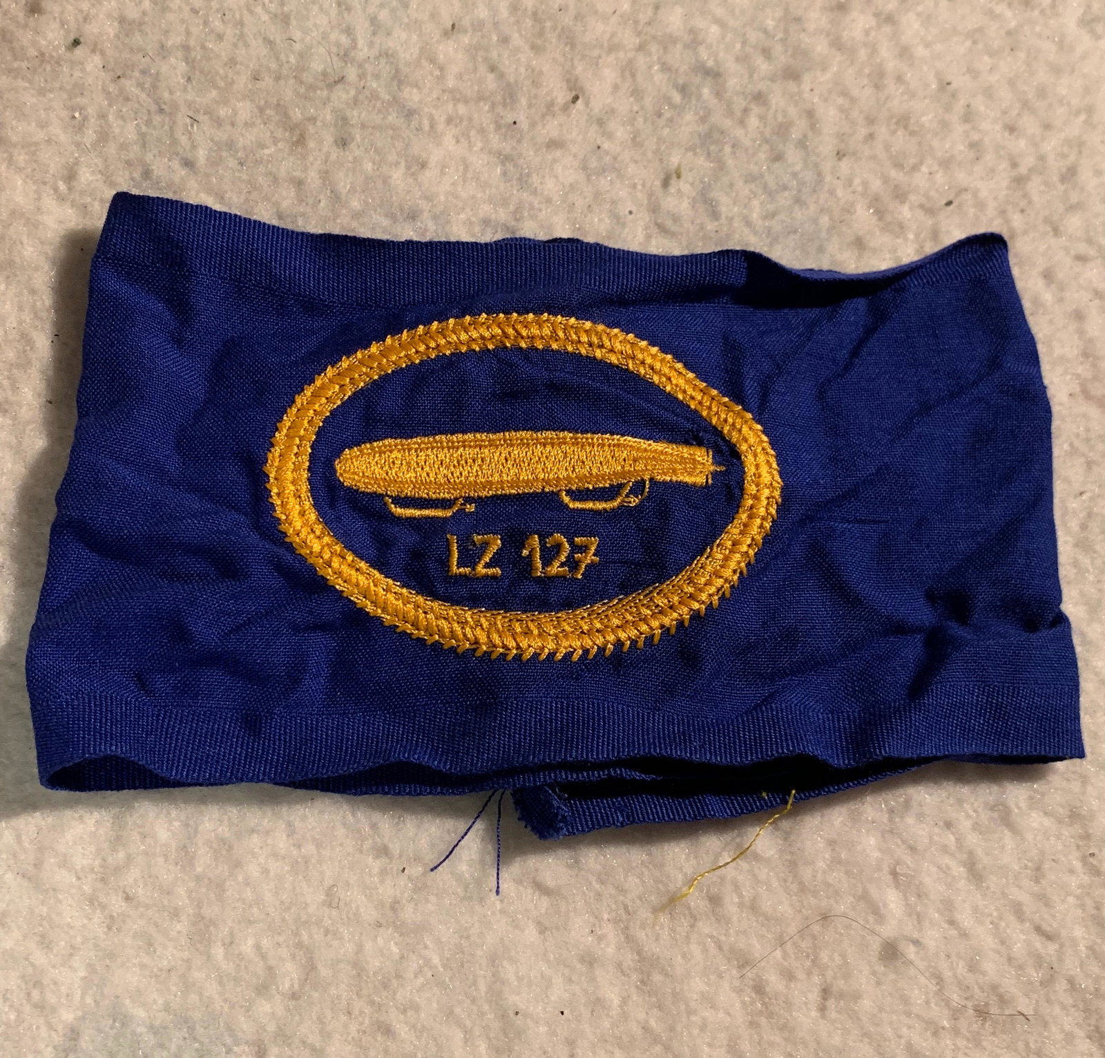 WW2 GERMAN LZ 127 GRAF ZEPPELIN ARMBAND: WW2 GERMAN LZ 127 GRAF ZEPPELIN ARMBAND. IN EXCELLENT SHAPE AND OVERALL CONDITION. A VERY RARE FIND AND AN EXCELLENT ADDITION TO YOUR BELOVED COLLECTION.