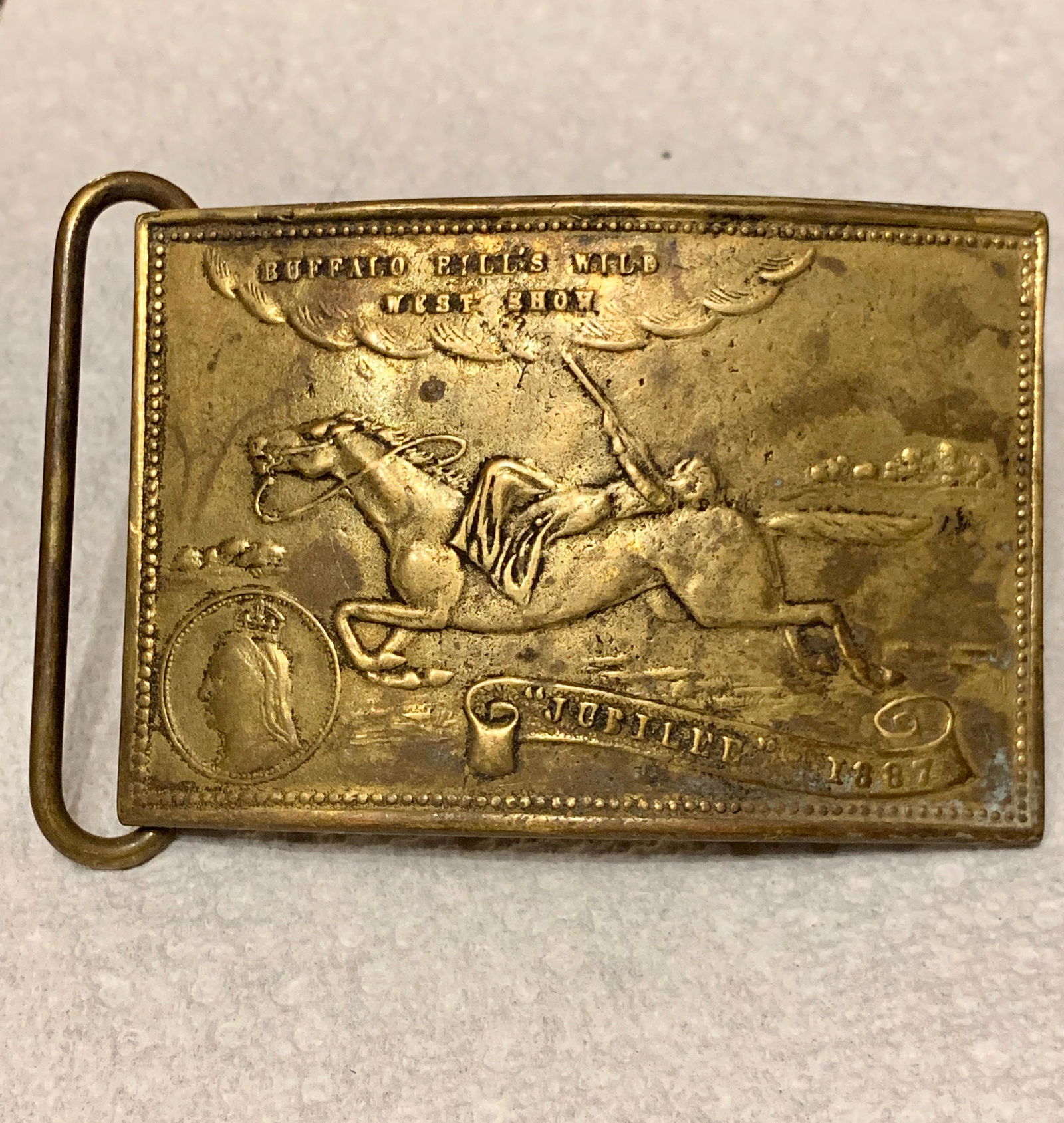 1887 BUFFALO BILL'S WILD WEST BELT BUCKLE BY TIFFANY: RARE 1887 BUFFALO BILL'S WILD WEST BELT BUCKLE BY TIFFANY & CO. ALSO MARKED ON THE BACK IS EARLS COURT EXHIBITION. A VERY RARE FIND AND AN EXCELLENT ADDITION TO YOUR COLLECTION.
