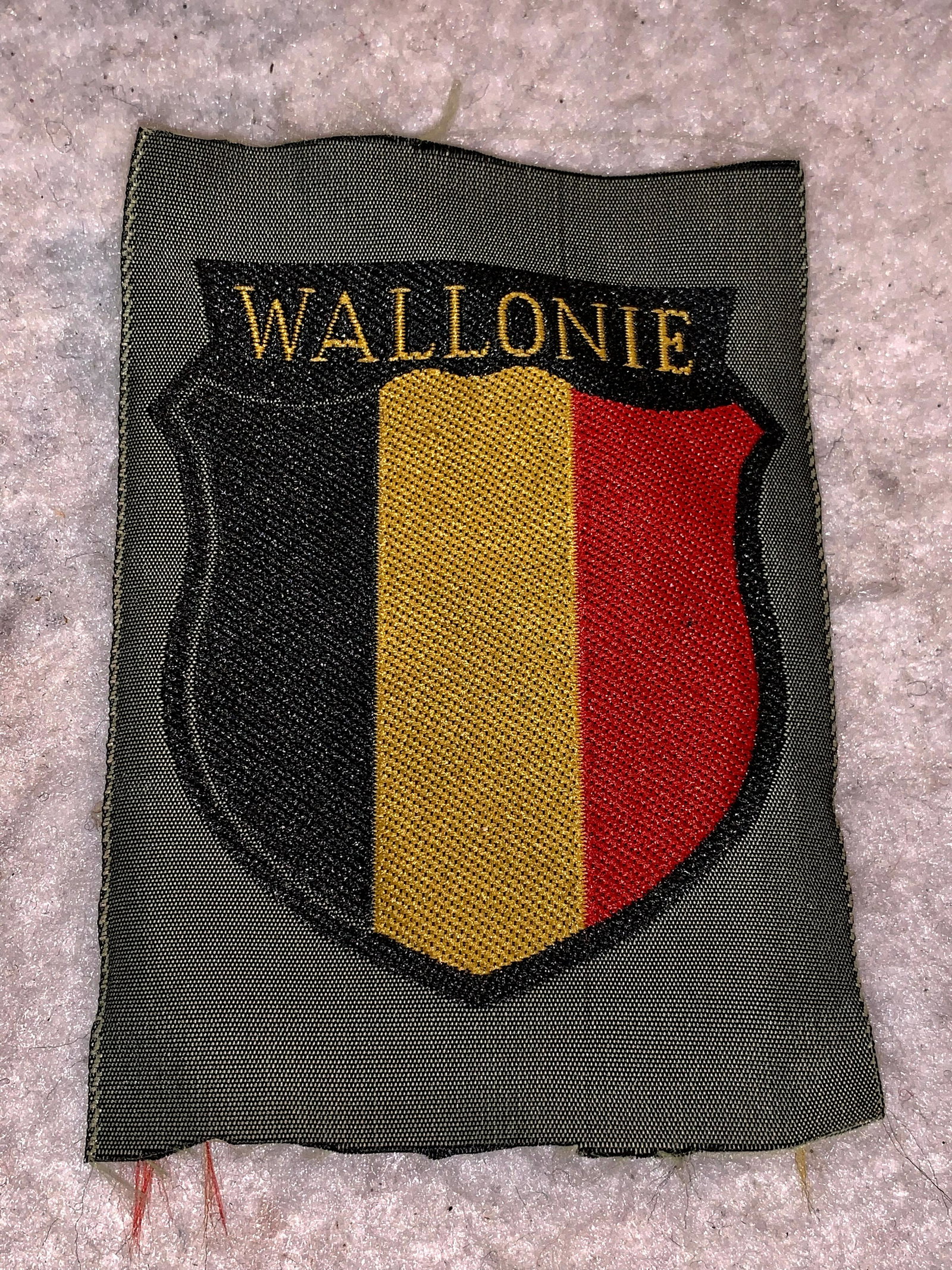WW2 GERMAN WALLONIE WALLOON LEGION SLEEVE PATCH: WW2 GERMAN WALLONIE WALLOON LEGION SLEEVE PATCH FOR BELGIAN VOLUNTEER FOR THE GERMAN ARMY. IN GREAT OVERALL SHAPE AND CONDITION. A RARE FIND AND AN EXCELLENT ADDITION TO YOUR COLLECTION.