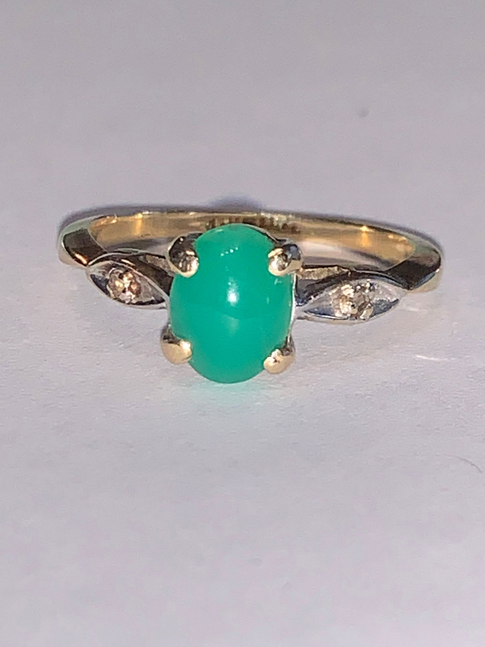 14K GOLD 0.50 CT OVAL EMERALD RING: 14K GOLD 0.50 CT OVAL EMERALD RING. RING IS A SIZE 6.5 AND WEIGHS 2 GRAMS.