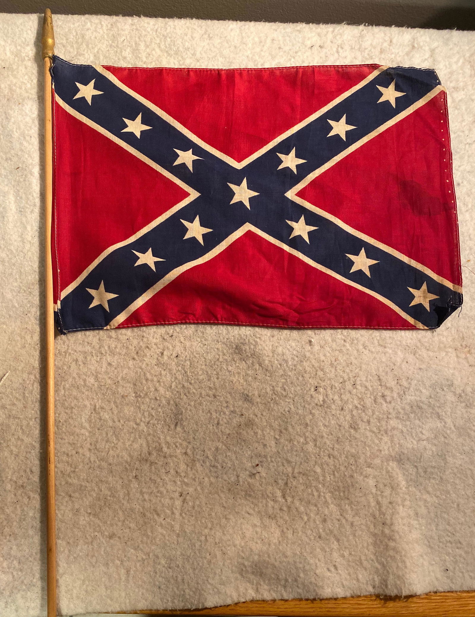 POST CIVIL WAR 13 STAR CONFEDERATE HAND FLAG: POST CIVIL WAR 13 STAR CONFEDERATE HAND FLAG. IN EXCELLENT SHAPE AND OVERALL CONDITION. THE COLOR ARE STILL STRIKING AND HAVEN'T FADED. BEAUTIFUL CONFEDERATE FLAG TO ADD TO YOUR CIVIL WAR OR ANY MILIT