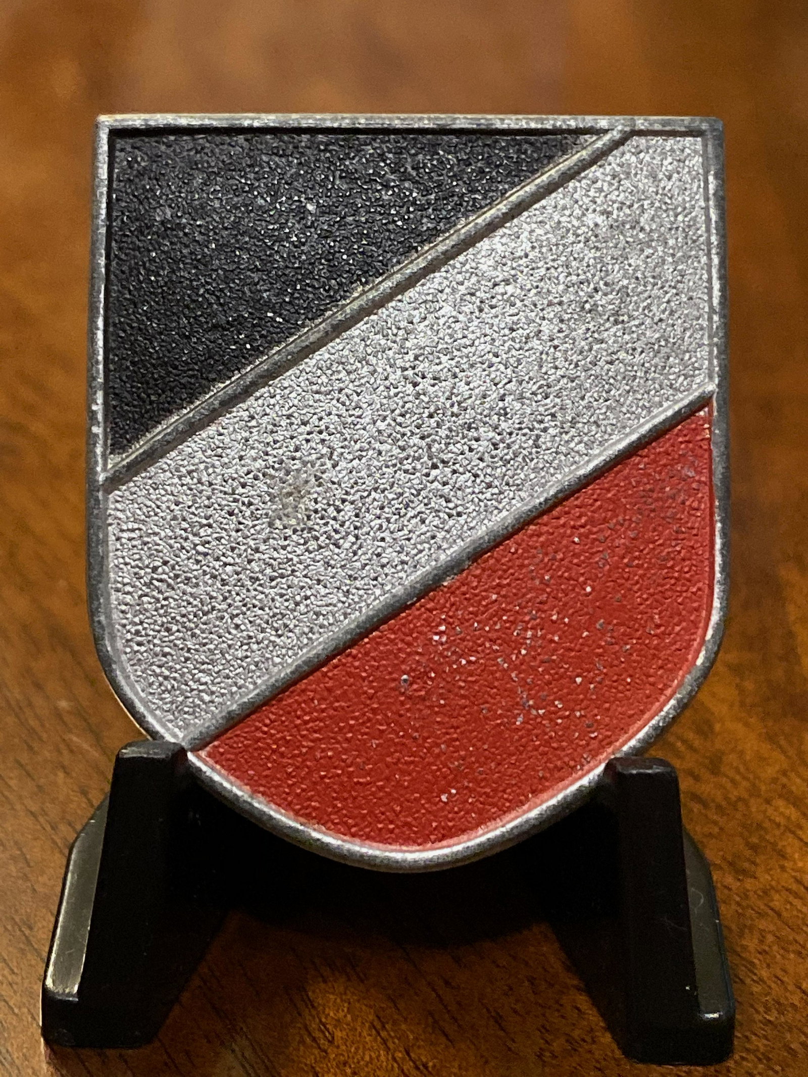 WW2 GERMAN TROPICAL PITH HELMET TRI COLOR SHIELD: WW2 GERMAN TROPICAL PITH HELMET TRI COLOR SHIELD. COMES FROM A WW2 MUSEUM COLLECTION OF ARTIFACTS. IN EXCELLENT SHAPE AND OVERALL CONDITION. MARKED WITH MAKER MARKS ON THE BACK. GUARANTEED 100% AUTHEN