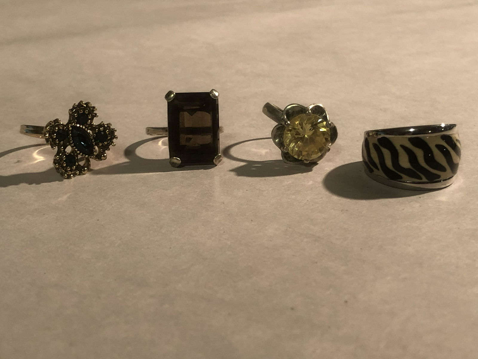 LOT OF (4) RINGS - STERLING SILVER, ETC.: LOT OF (4) RINGS - STERLING SILVER, ETC. A GREAT LOT! AN EXCELLENT ADDITION TO YOUR COLLECTION.