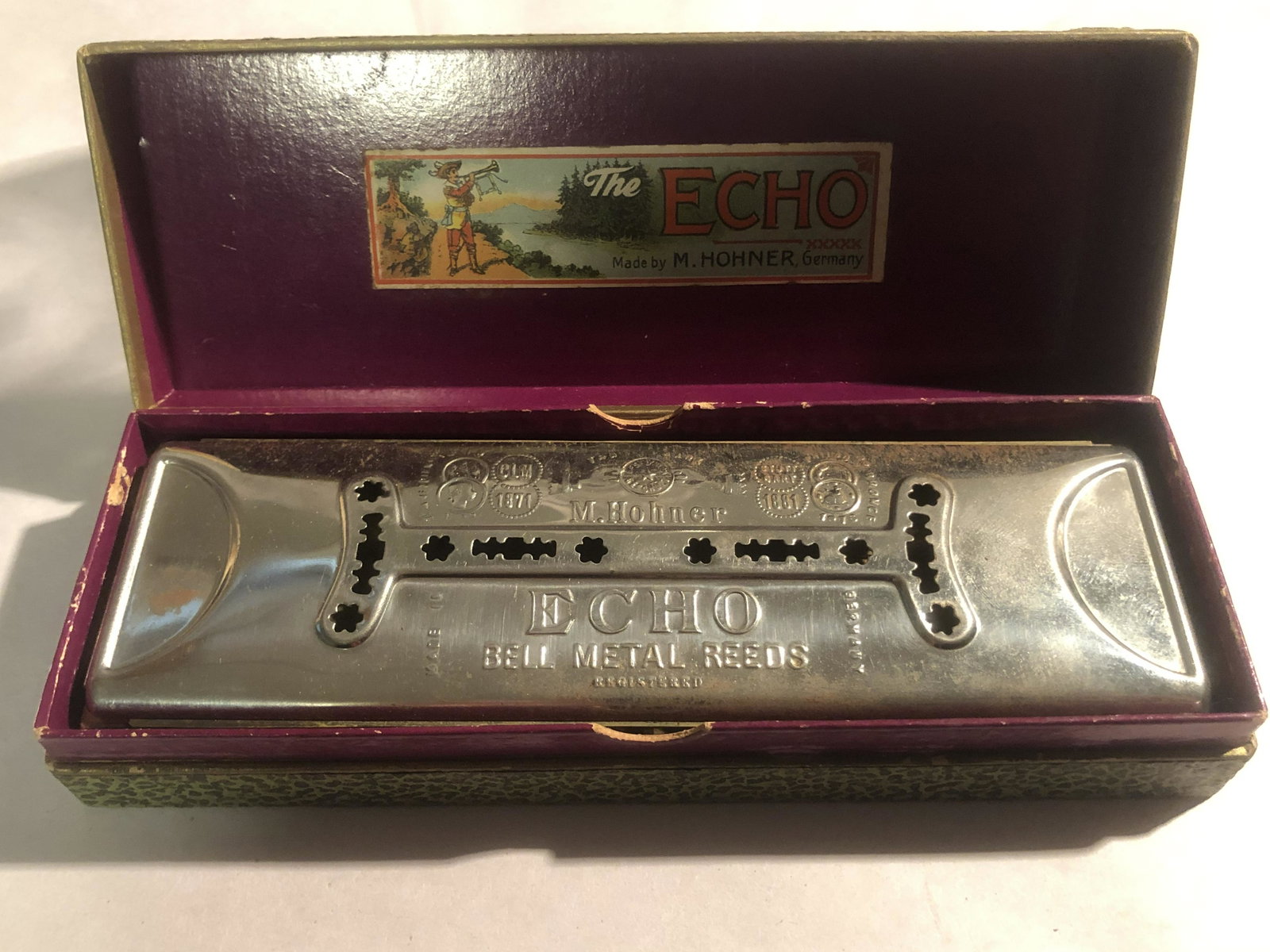 THE ECHO M. HONNER GERMAN HARP W/BOX: THE ECHO M. HONNER GERMAN HARP W/BOX. IN EXCELLENT SHAPE AND OVERALL CONDITION. COMES WITH THE ORIGINAL BOX. A GREAT FIND AND AN EXCELLENT ADDITION TO YOUR COLLECTION.