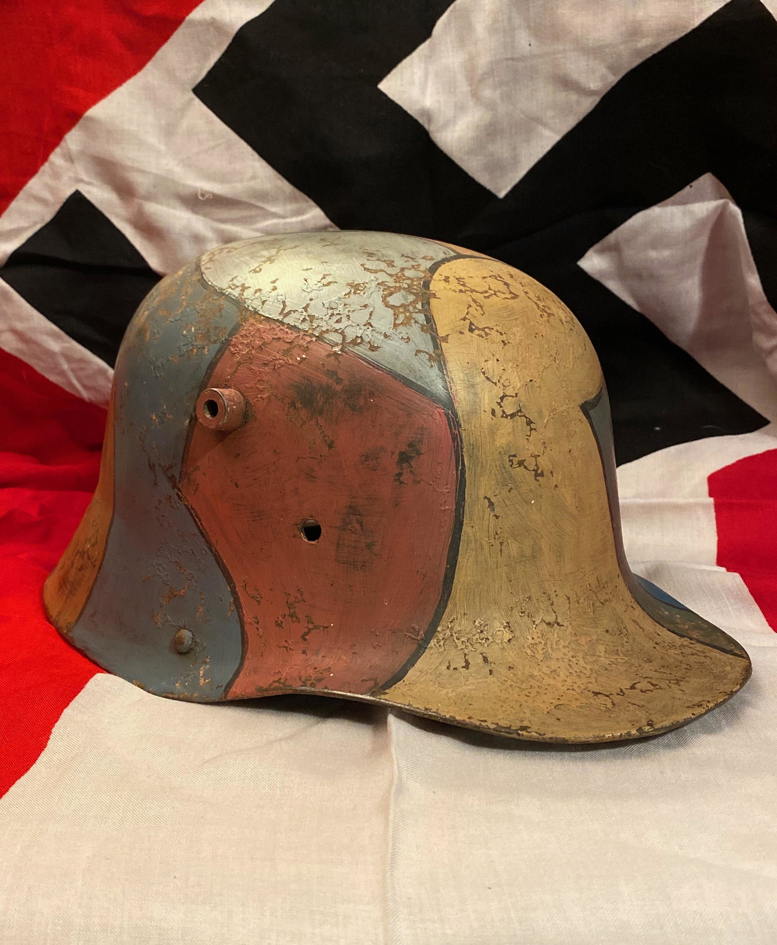 AUTH. WW2 GERMAN NORMANDY CAMO HELMET: AUTH. WW2 GERMAN NORMANDY CAMO HELMET. IN EXCELLENT SHAPE AND OVERALL CONDITION. THIS HELMET WAS MOST LIKELY PAINTED BY THE SOLDIER WHO WAS STATIONED IN NORMANDY DURING THE WAR. HAS A BEAUTIFUL OVERAL