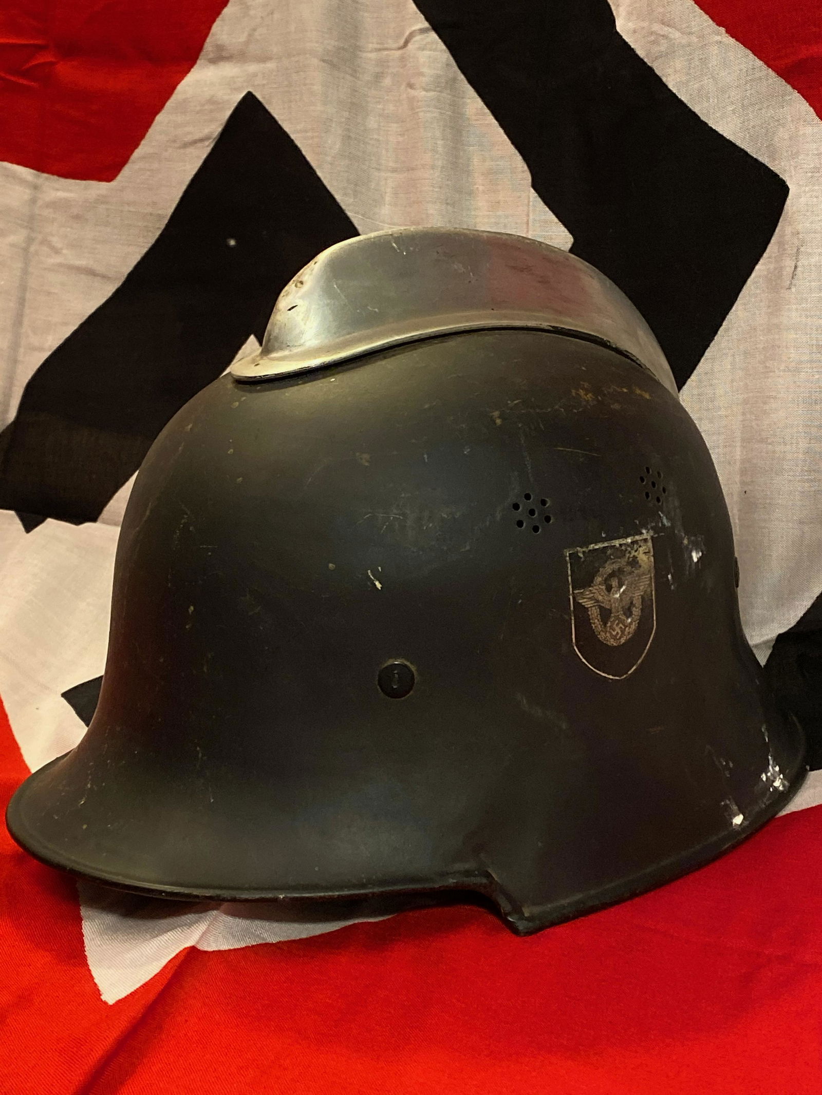 WW2 GERMAN NAZI FIRE POLICE HELMET: WW2 GERMAN NAZI FIRE POLICE HELMET. THIS IS A RARE FIND. IN MINT AND EXCELLENT OVERALL CONDITION FOR ITS AGE. THIS WAS BROUGHT BACK HOME BY A VET. HAS A BEAUTIFUL OVERALL PATINA. SHOWS A TON OF USAGE