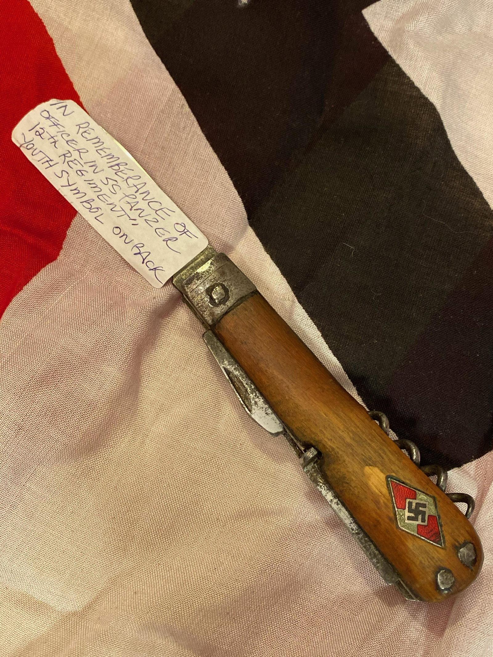 WW2 GERMAN HITLER YOUTH CAMP KNIFE W/PANZER OFFICER: WW2 GERMAN HITLER YOUTH CAMP KNIFE W/PANZER OFFICER REMEMBERANCE ID. THIS IS A VERY VERY RARE FIND. THIS IS A WW2 GERMAN HITLER YOUTH KNIFE WITH THE HITLER YOUTH SYMBOL. IN THE BACK OF THE KNIFE IS AN