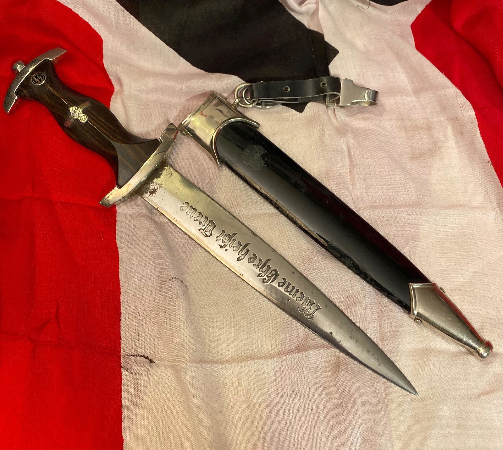 RARE WW2 GERMAN WIKING SS DAGGER W/SHEATH: RARE WW2 GERMAN WIKING SS DAGGER W/SHEATH. IN GOOD OVERALL SHAPE AND CONDITION. DAGGER APPEARS TO BE WELL USED - VIEW PICTURES. BLADE IS MARKED RZM M7/36 WITH MEINE EHRE HEIBT TREUE. OVERALL IN GOOD C