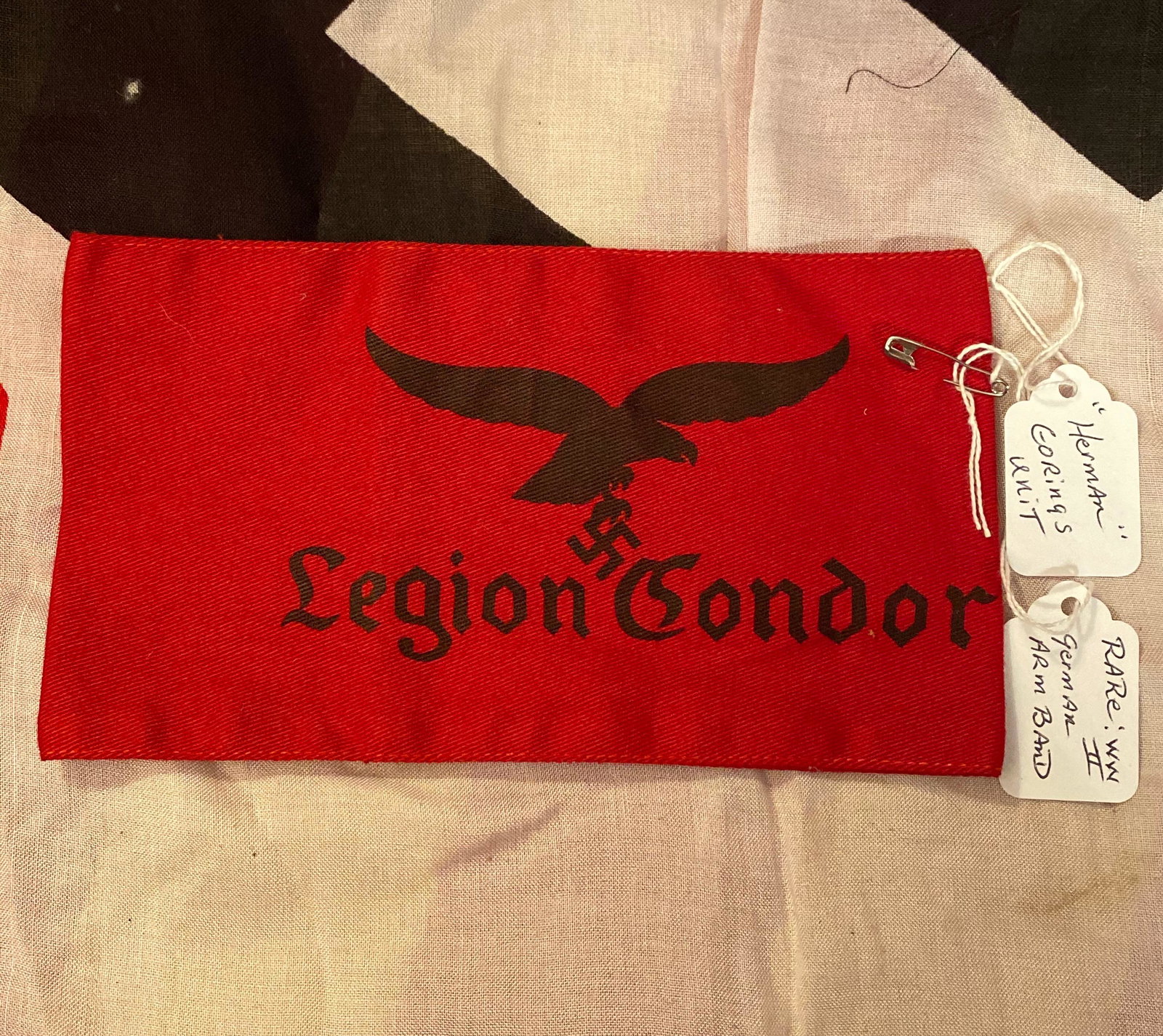 WW2 GERMAN LEGION CONDOR HERMAN GORING UNIT ARMBAND: WW2 GERMAN LEGION CONDOR HERMAN GORING UNIT ARMBAND. IN MINT OVERALL SHAPE AND CONDITION. A GREAT FIND AND AN EXCELLENT ADDITION TO YOUR COLLECTION. HAS A BEAUTIFUL OVERALL PATINA. A RARE FIND!