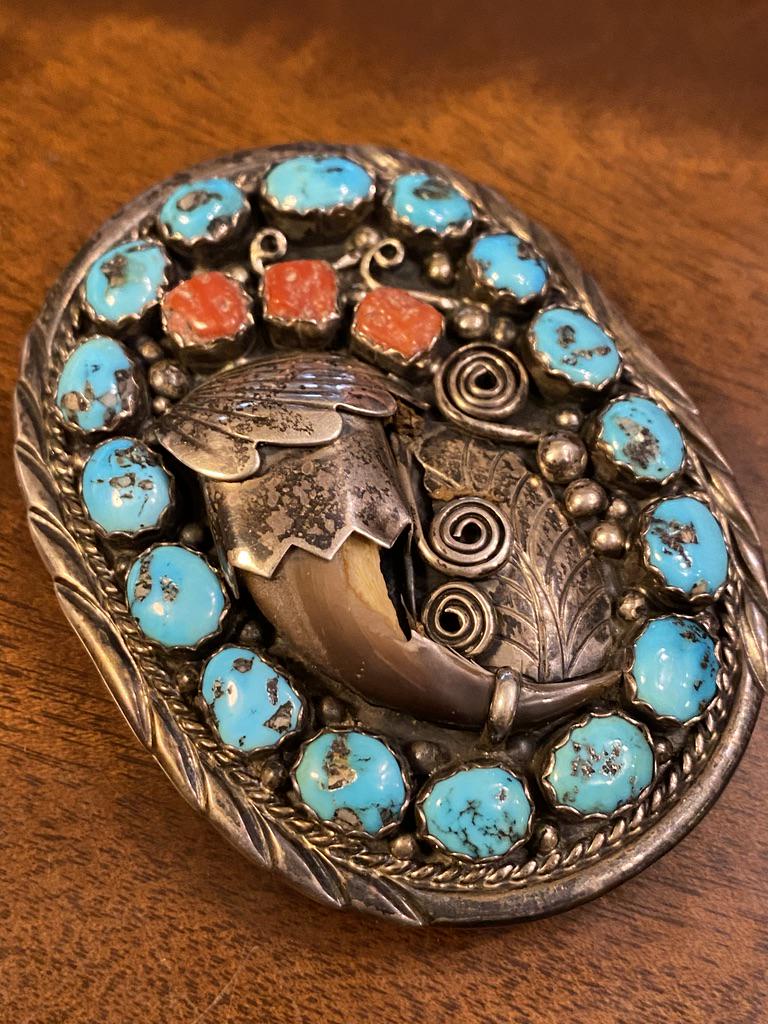 NATIVE AMERICAN STERLING SILVER TURQUOISE BELT BUCKLE: NATIVE AMERICAN STERLING SILVER TURQUOISE BELT BUCKLE. INLAID WITH BEAUTIFUL TURQUOISE AND CORAL STONES. VERY NEATLY DONE AND WELL MADE. THIS BELT BUCKLE WEIGHS 60 GRAMS