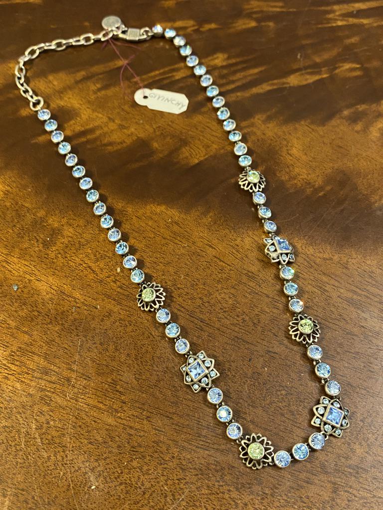 GIVENCHY AQUAMARINE STERLING NECKLACE: GIVENCHY AQUAMARINE STERLING NECKLACE. IN EXCELLENT SHAPE AND OVERALL CONDITION. A GREAT ADDITION TO YOUR COLLECTION. HAS BEAUTIFUL AQUAMARINE AND PERIDOT GEMSTONES