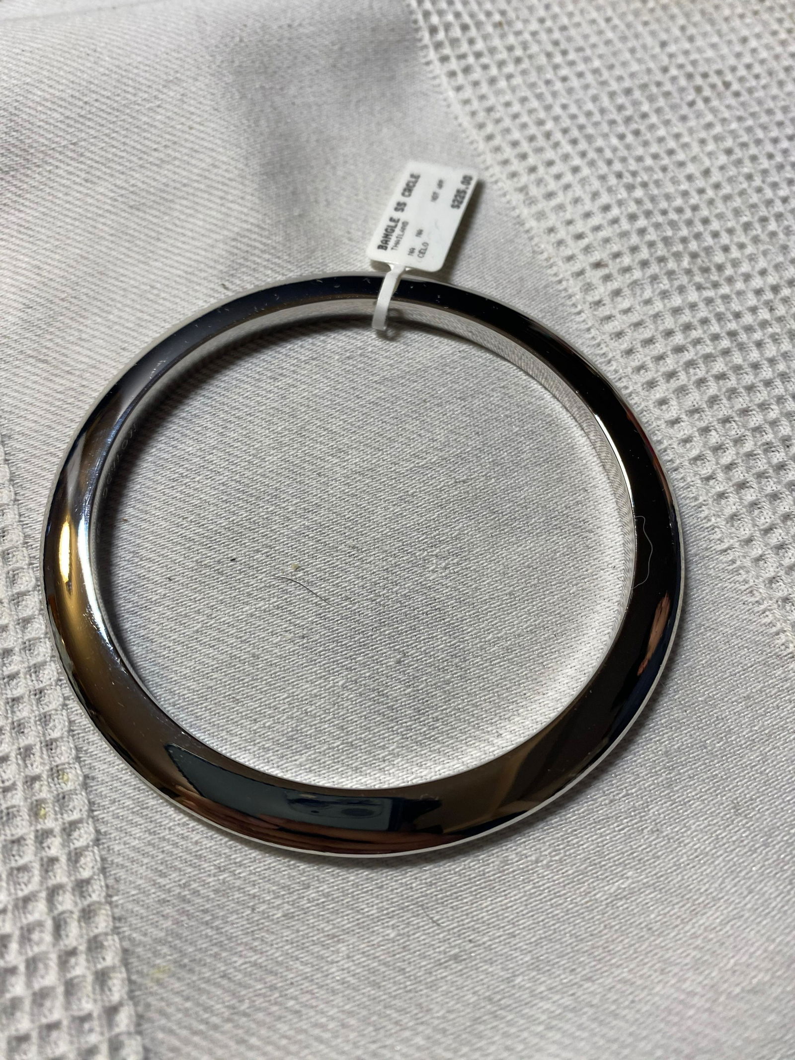 MOVADO STERLING SILVER BANGLE BRACELET: MOVADO STERLING SILVER BANGLE BRACELET. COMES WITH TAGS. A GREAT ADDITION TO YOUR COLLECTION.