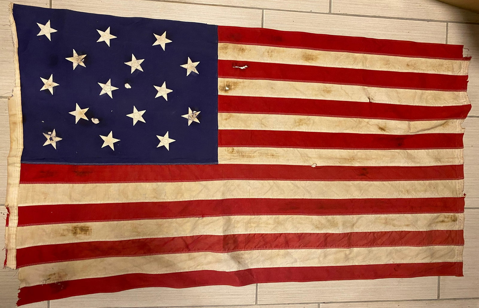 EXTREMELY RARE OLD 15 STAR U.S. FLAG: VERY RARE OLD 15 STAR U.S. FLAG. IN GOOD SHAPE AND OVERALL CONDITION. APPEARS TO BE MORE THAN 150 YEARS OLD. HAS A BEAUTIFUL OVERALL PATINA WITH A FEW RIPS, TEARS, AND MOTH HOLES. A GREAT FIND AND AN 