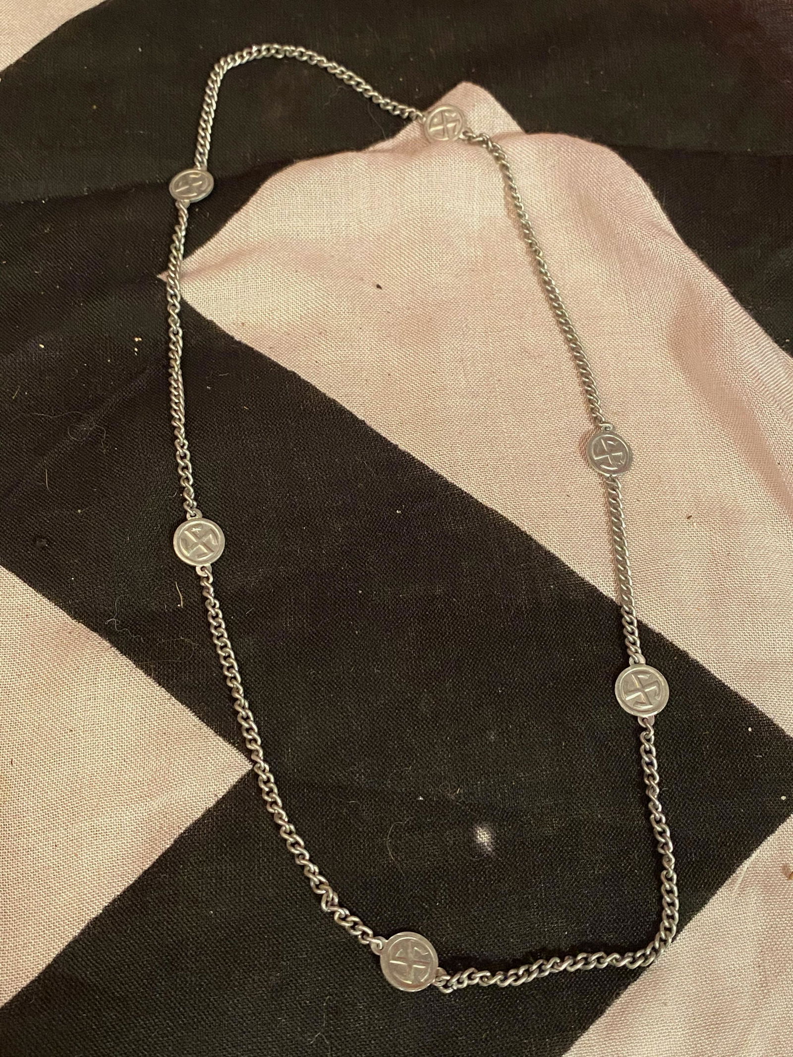 RARE WW2 GERMAN SS WIKING NECKLACE: RARE WW2 GERMAN SS WIKING NECKLACE - IN SILVER. THIS IS A VERY RARE FIND. GUARANTEED 100% AUTHENTIC. HAS A BEAUTIFUL OVERALL PATINA. A GREAT FIND AND AN EXCELLENT ADDITION TO YOUR COLLECTION.