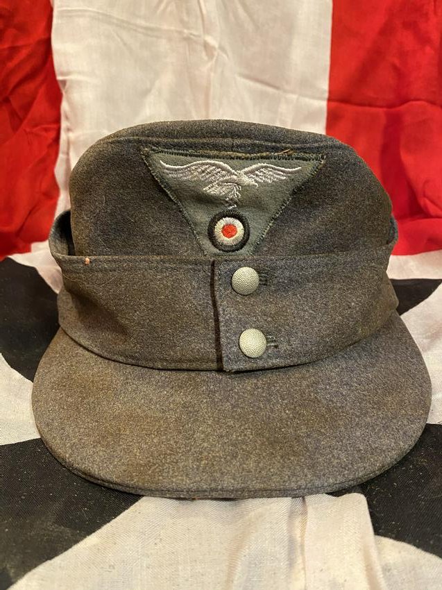 WW2 GERMAN NAZI LUFTWAFFE M43 FIELD CAP W/ MAKER MARKS: WW2 GERMAN NAZI LUFTWAFFE M43 FIELD CAP W/ MAKER MARKS. IN MINT OVERALL SHAPE AND CONDITION WITH A BEAUTIFUL OVERALL PATINA. HAS MAKER MARKS ON THE INSIDE. APPEARS TO BE WELL USED DURING BATTLE. PLEAS