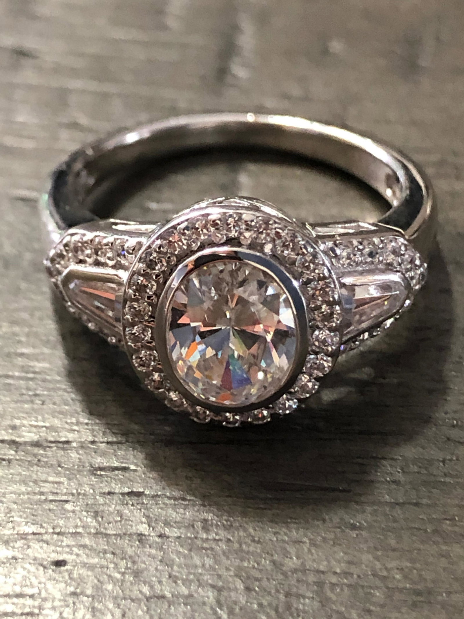 CUSTOM STERLING SILVER CZ WEDDING RING: CUSTOM STERLING SILVER CZ WEDDING RING. IN MINT OVERALL SHAPE AND CONDITION. A GREAT ADDITION TO YOUR COLLECTION.
