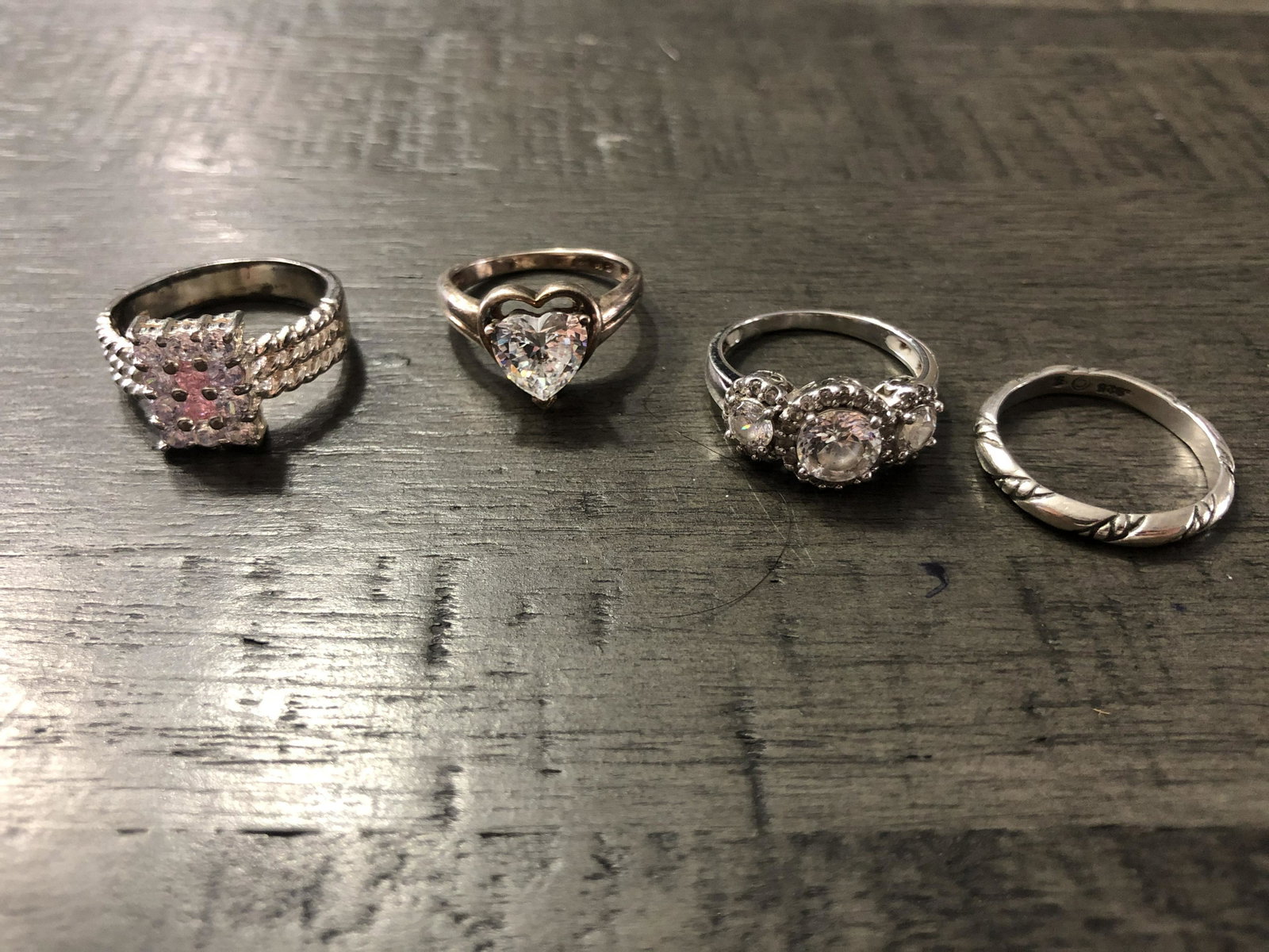 LOT OF (4) STERLING SILVER WEDDING RINGS AND BANDS: LOT OF (4) STERLING SILVER WEDDING RINGS AND BANDS. A GREAT FIND AND AN EXCELLENT ADDITION TO YOUR COLLECTION.