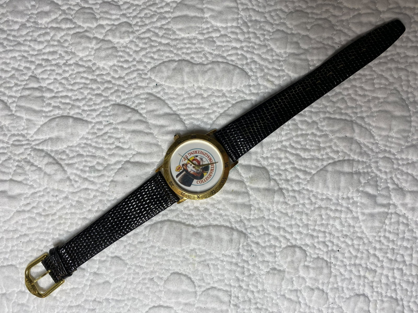 LOGO TIMEPIECES BY INFINITY 18K GOLD PLATED WATCH: LOGO TIMEPIECES BY INFINITY 18K GOLD PLATED WATCH. MIGHT NEED A NEW BATTERY. PLEASE VIEW PICTURES. A GREAT ADDITION TO YOUR COLLECTION.