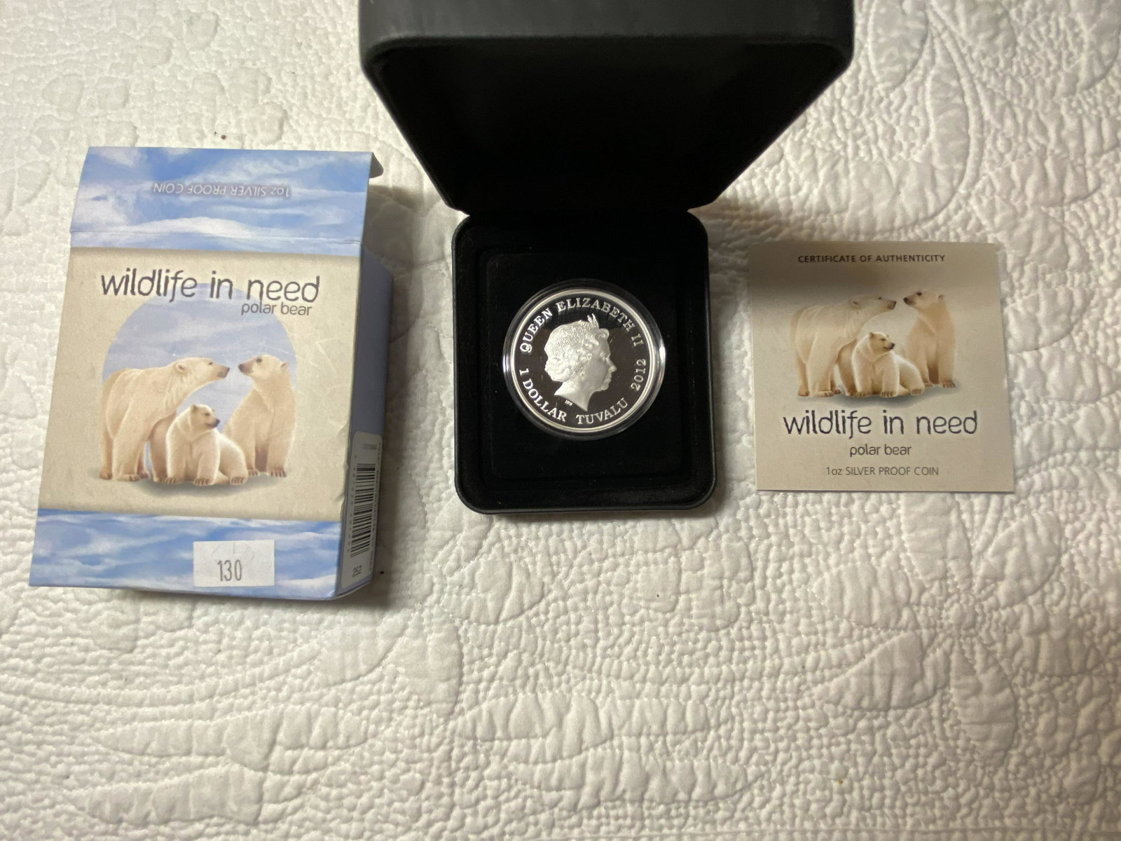1 OZ SILVER COIN POLAR BEAR WILD LIFE IN NEED: 1 OZ SILVER COIN POLAR BEAR WILD LIFE IN NEED. COMES WITH ORIG. CASE, ETC. A GREAT ADDITION TO YOUR COLLECTION.