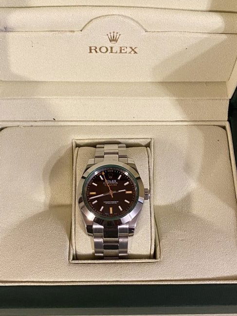 ROLEX MILGAUSS WATCH WITH BOX - UNAUTHENTICATED: ROLEX MILGAUSS WATCH WITH BOX - UNAUTHENTICATED. RUNS GREAT AND KEEPS GOOD TIME. COMES WITH THE BOX. THIS IS AN ESTATE FIND. WATCH KEEPS PERFECT TIME. A GREAT ADDITION TO YOUR WATCH COLLECTION. SELLIN