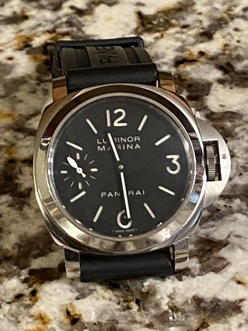 PANERAI LUMINOR MARINA WATCH - MUSEUM BACK: PANERAI LUMINOR MARINA WATCH - MUSEUM BACK. THIS WATCH HAS NOT BEEN AUTHENTICATED. RUNS AND KEEPS PERFECT TIME. PLEASE LOOK AT THE MOVEMENT AS IT HAS A MUSEUM BACK. A GREAT FIND AND AN EXCELLENT ADDIT