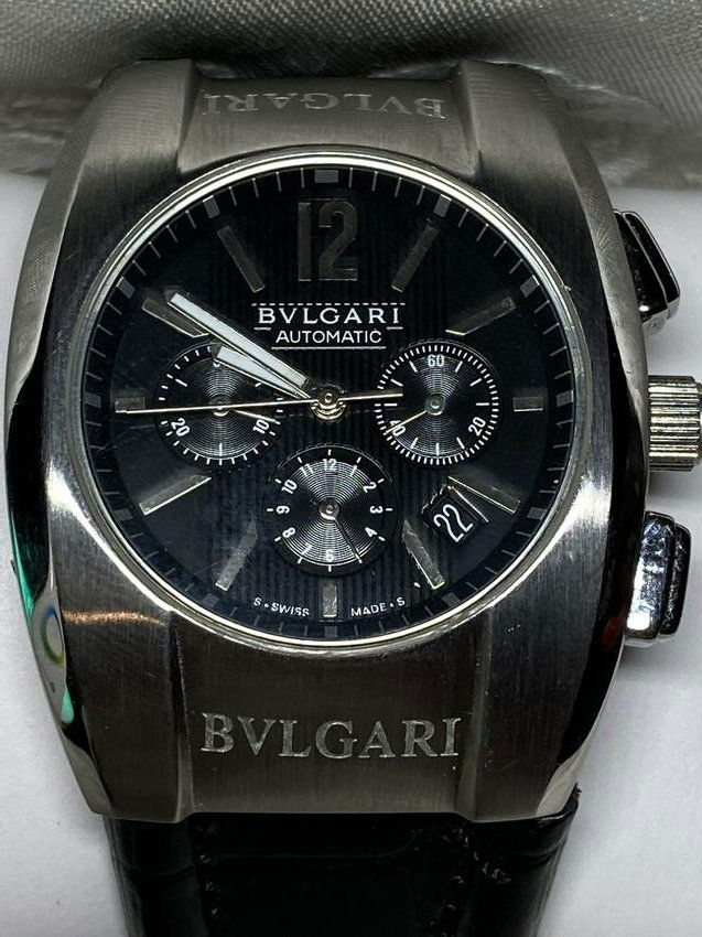 BVLGARI CHRONOGRAPH MENS AUTOMATIC WATCH: BVLGARI CHRONOGRAPH MENS AUTOMATIC WATCH. THIS LOT IS UNAUTHENTICATED. WATCH DOES RUN, HOWEVER WE ARE NOT SURE ABOUT THE ACCURACY OF TIME. SOLD AS-IS. PLEASE VIEW ALL DETAILED PICTURES. A GREAT WATCH