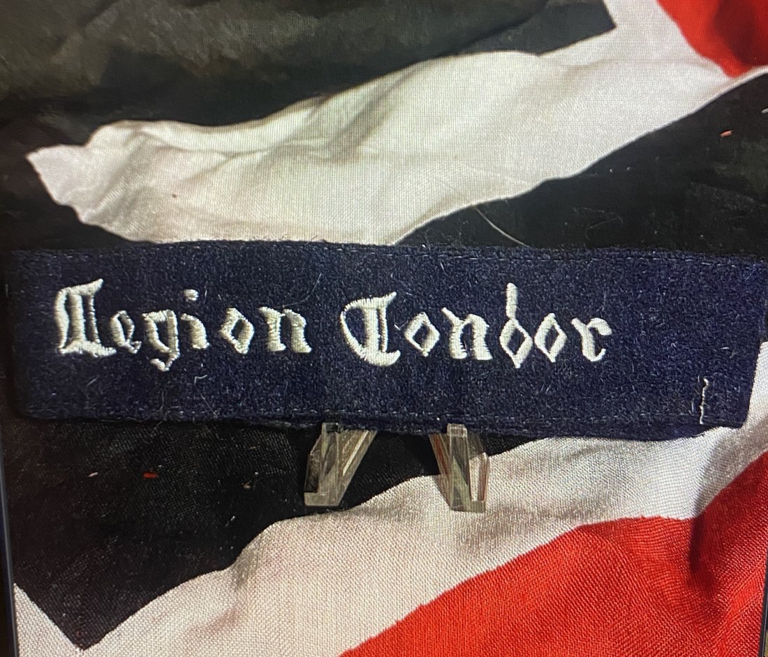 RARE WW2 GERMAN LEGION CONDOR CUFF TITLE: RARE WW2 GERMAN LEGION CONDOR CUFF TITLE. Legion Condor Cufftitle - Cufftitle for NCOs, in soft blue wool, sewn together at the ends, tunic removed; this cufftitle is machine embroidered in silvery th