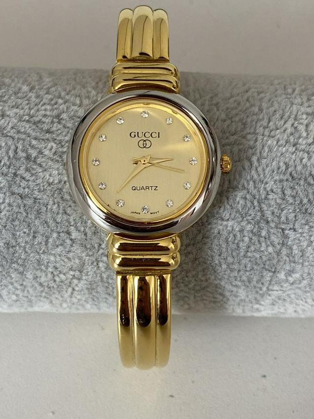 gucci women's gold and silver watch