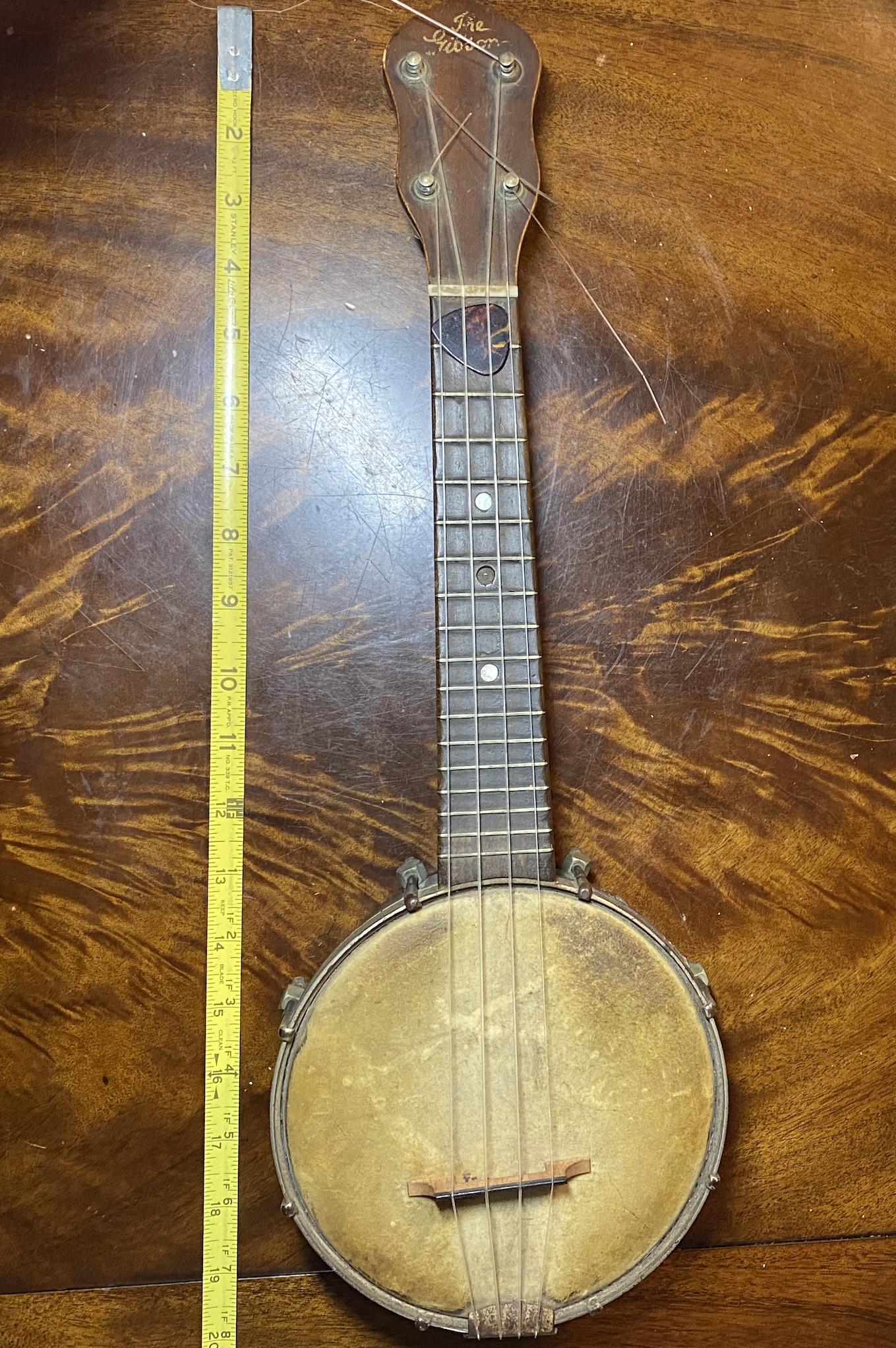 RARE THE GIBSON MUSICAL INSTRUMENT: RARE THE GIBSON MUSICAL INSTRUMENT. IN OVERALL SHAPE AND CONDITION. A GREAT FIND AND AN EXCELLENT ADDITION TO YOUR COLLECTION.