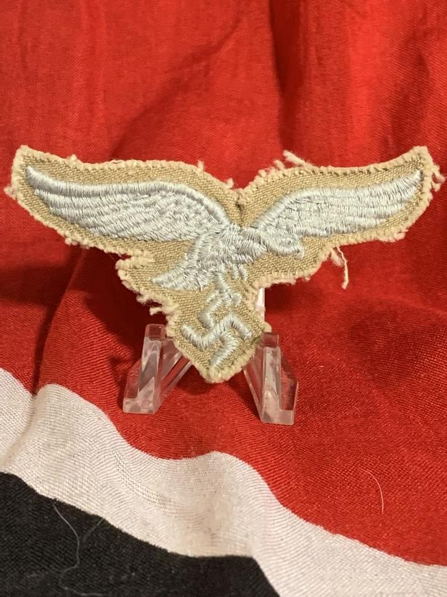 WW2 GERMAN AFRIKA KORPS LUFTWAFFE CAP PATCH: WW2 GERMAN AFRIKA KORPS LUFTWAFFE CAP PATCH. WAS PROBABLY TAKEN RIGHT OFF THE AFRIKA KORPS FIELD CAP. IN MINT OVERALL SHAPE AND CONDITION. A GREAT FIND AND AN EXCELLENT ADDITION TO YOUR COLLECTION.